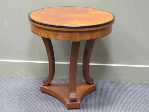 Lot 549 - An Empire style small dark wood circular table...