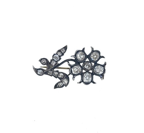 Lot 79 - A Victorian diamond set flower brooch