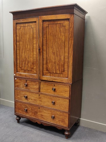 Lot 560 - A Regency mahogany linen press, the lower...