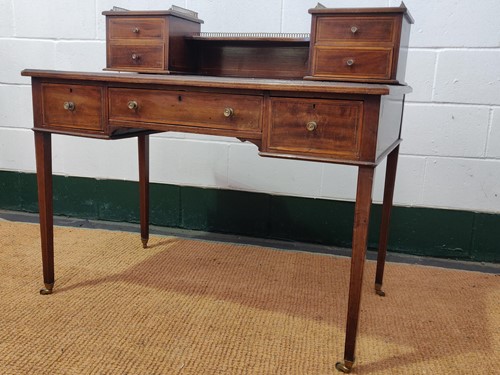 Lot 551 - A line inlaid mahogany desk, early 19th...