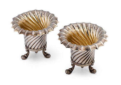 Lot 523 - A pair of continental metalwares plant holders