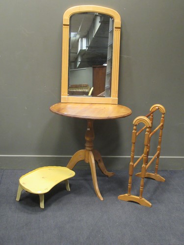 Lot 533 - A pine circular tripod table 74cm high and...