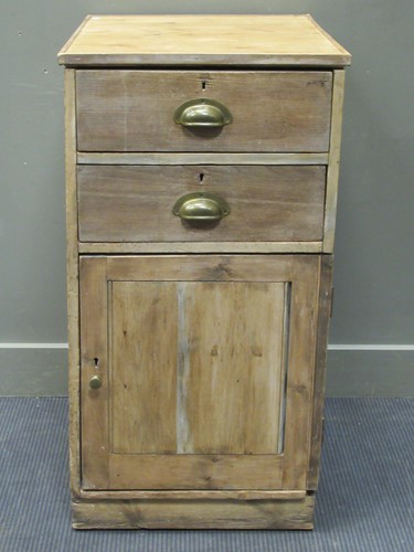 Lot 534 - A 20th century pine cabinet comprising of two...