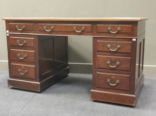 Lot 577 - A George III style mahogany pedestal desk...