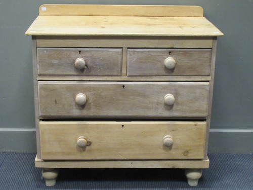 Lot 532 - A pine chest of two short over two long...