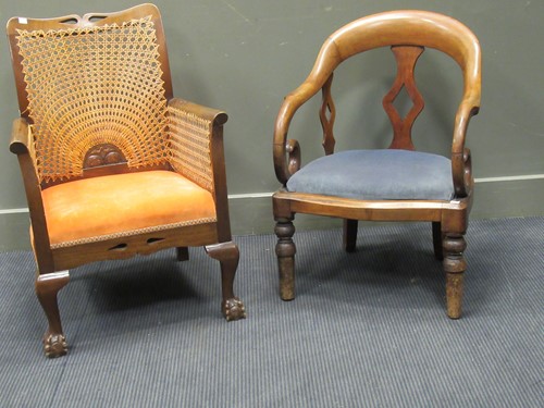 Lot 512 - A 19th century mahogany armchair with scolled...