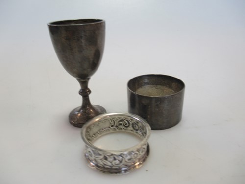 Lot 266 - A silver chain maille coin purse, three silver...
