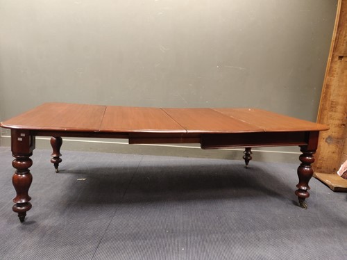 Lot 523 - A Victorian mahogany extending dining table...
