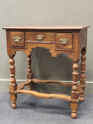 Lot 631 - A William & Mary style walnut low boy,...
