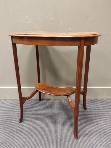 Lot 584 - An Edwardian inlaid mahogany kidney shaped...
