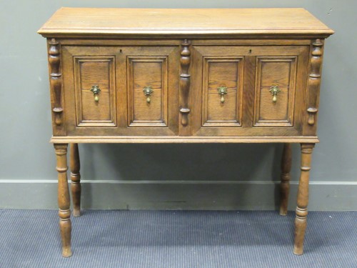 Lot 575 - A 17th century style oak two drawer side...