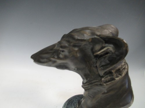 Lot 97 - A bronzed resin model of a Whippet's head,...