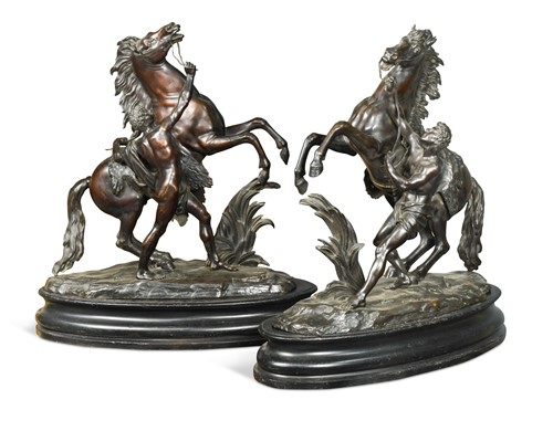 Lot 439 - After Guillaume Coustou (1677-1746), a large pair of bronze 'Marly Horses'