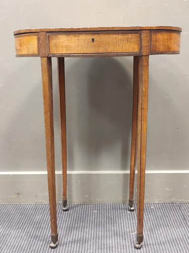 Lot 506 - A George III satinwood oval table the top...