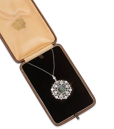 Lot 275 - A cat's eye chrysoberyl and diamond pendant/brooch