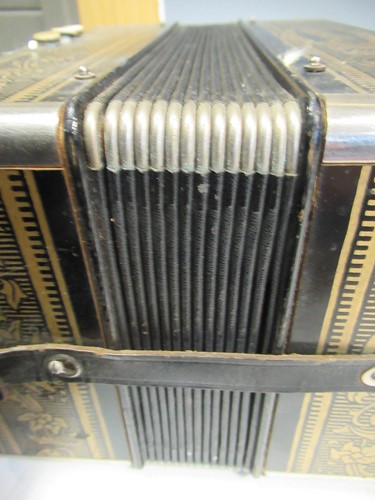 Lot 63 - Two vintage squeeze boxes, one by Hohner, the...