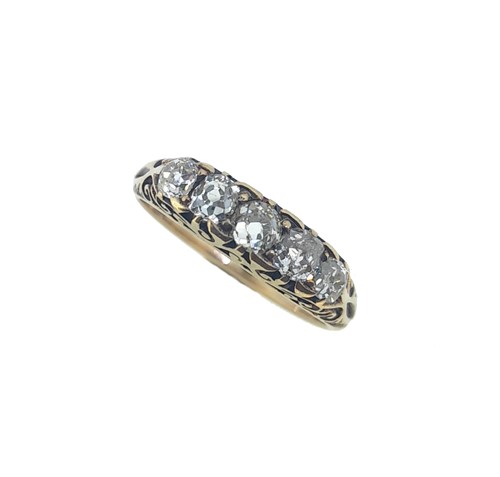 Lot 73 - A diamond set carved half hoop style ring