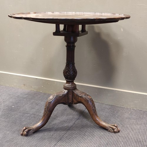Lot 563 - A 19th century mahogany tripod table, the...