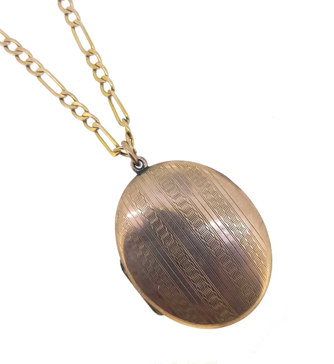 Click H Locket Lot 130 - A hinged picture locket and chain,