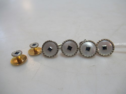 Lot 225 - A set of buttons and studs, stamped '18CT W...