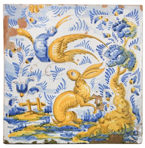 Lot 390 - A large maiolica tile