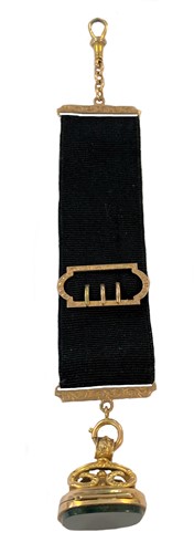 Lot 370 - An unusual hinged fob seal and Albertina