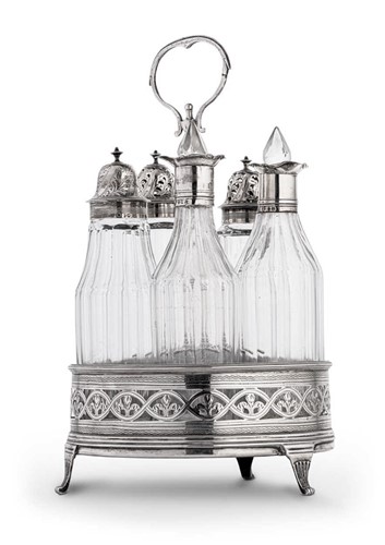 Lot 546 - A George III 18th century silver table cruet set and stand by the Batemans