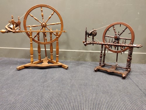 Lot 522 - Two Victorian turned wood spining wheels (2)