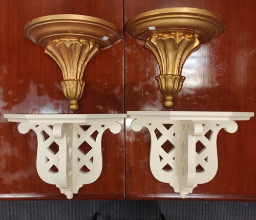 Lot 550 - A pair of gilt wooden wall brackets 32cm high;...