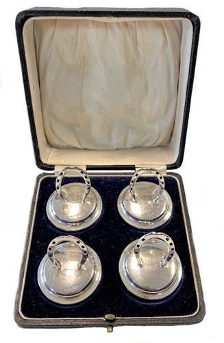 Lot 477 - A cased set of four silver menu holders, mark of George Unite & Sons
