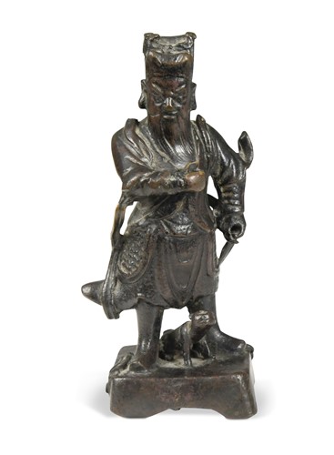 Lot 162 - A Chinese bronze small figure of an Official, late Ming Dynasty
