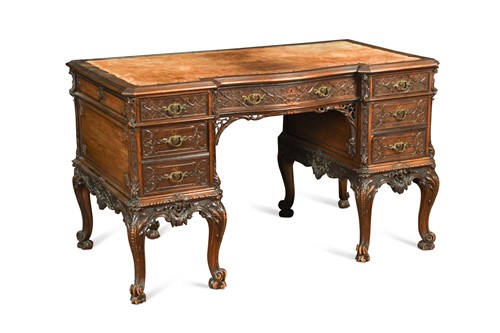 Lot 490 - A Chippendale style carved mahogany pedestal desk, late 19th century