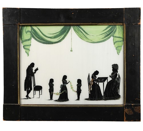 Lot 349 - A reverse glass painted silhouette of a family group, late 18th century