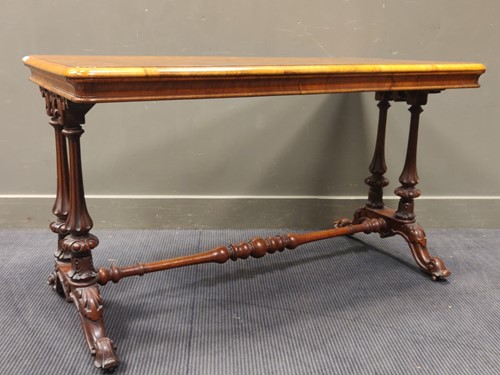 Lot 585 - A Victorian burr-walnut library table. the...