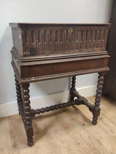 Lot 602 - A 17th century and later carved oak bible box...