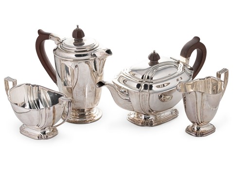 Lot 667 - A George VI silver 3-piece tea set with later hot water jug en suite