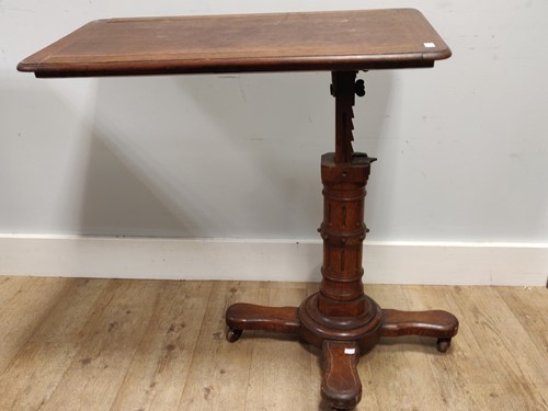 Lot 649 - A Victorian oak adjustable architects table in...