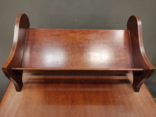 Lot 605 - An Edwardian line inlaid mahogany book trough...