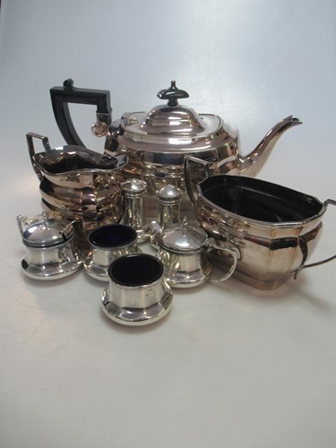 Lot 266 - An EPNS three piece teaset and six silver...