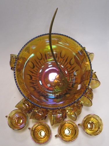 Lot 211 - An iridescent carnival glass punch bowl and...