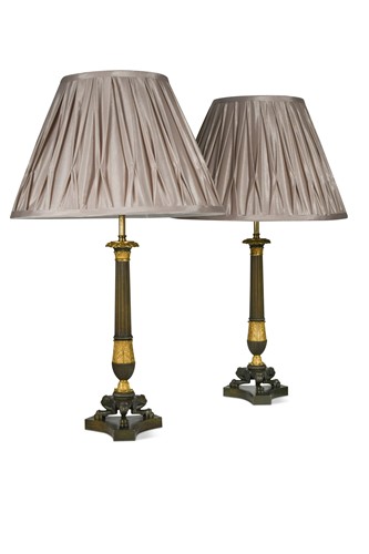 Lot 614 - A large pair of Regency bronze and ormolu triform candlestick lamps