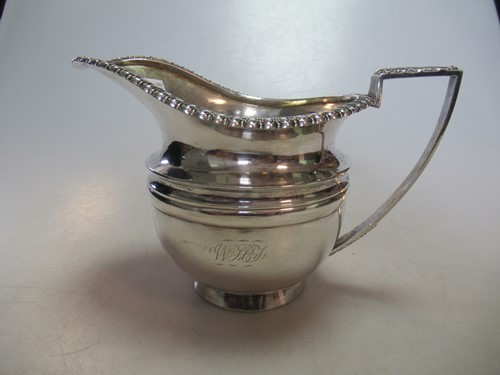 Lot 257 - An early 19th century silver milk jug, 11.7ozt