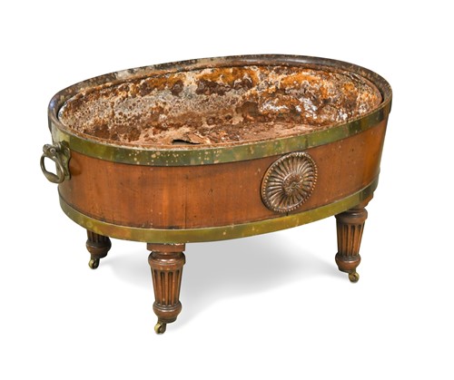 Lot 459 - A George III brass bound mahogany oval wine cooler
