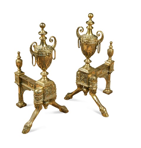 Lot 557 - A pair of Adam style fire dogs, circa 1900