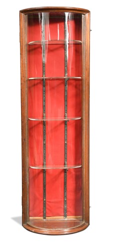 Lot 488 - A bow fronted mahogany glazed jeweller's cabinet, circa 1900