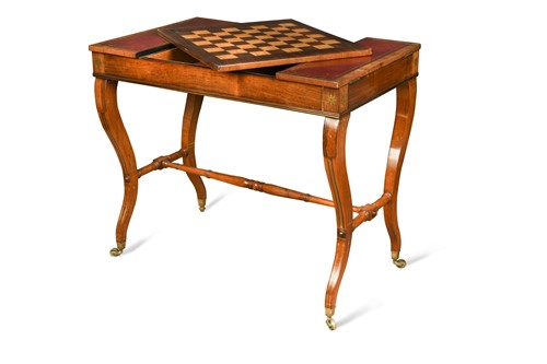 Lot 493 - A Regency combination brass inlaid rosewood writing / games table