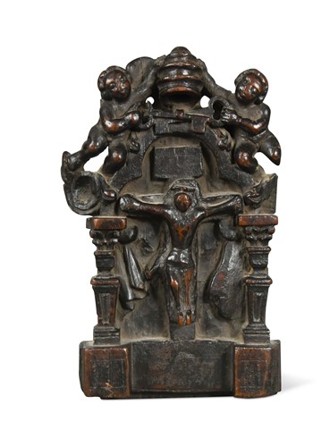 Lot 514 - A carved fruitwood panel depicting the Crucifixion, 17th century