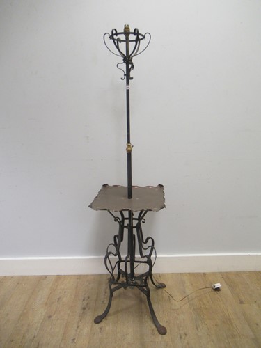 Lot 588 - In the manner of WAS Benson, an Arts & Crafts...
