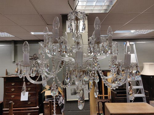 Lot 640 - A modern twelve branch chandelier, the...