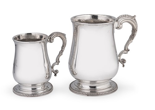 Lot 562 - Two George III 18th century silver tankards